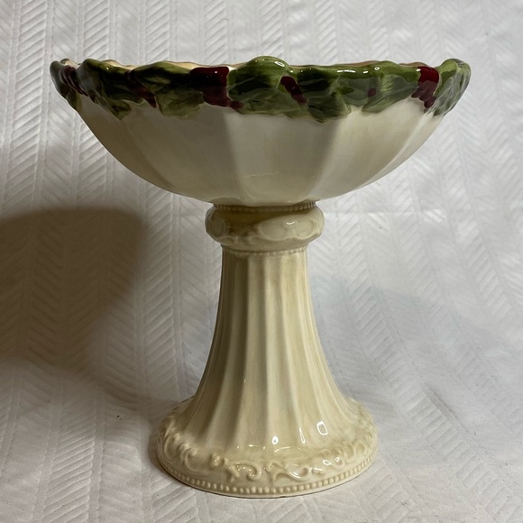 Cream ceramic serving/candy dish, pedestal base.